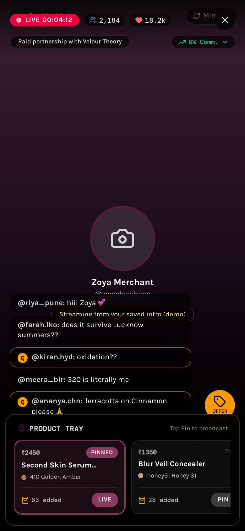 Host console mid-stream: viewer count, chat and the pinned product tray